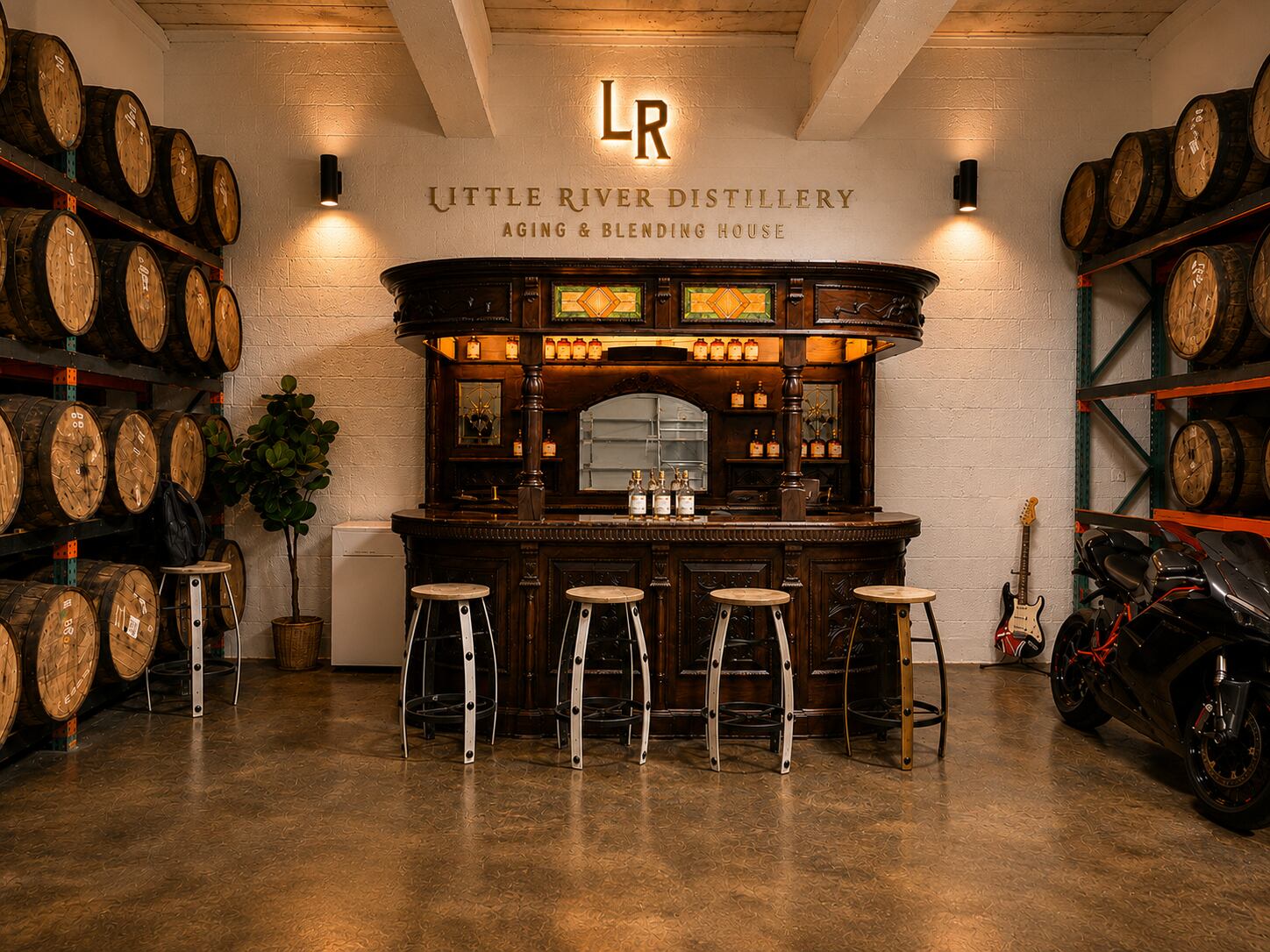 Little River Distillery tasting bar at night, with barrels behind the counter